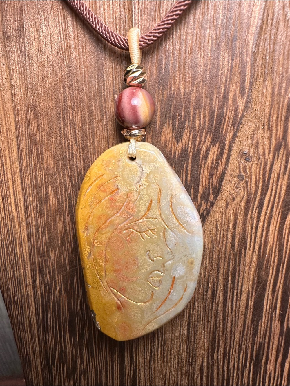 Coral Fossil Lady Profile Pendant Necklace on Brown Rope - Picture 5 of 14